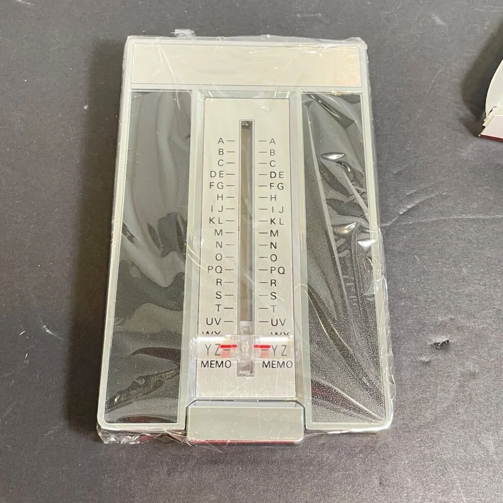 Vintage Telephone List Finder With Chrome Trimmed Design & Woodgrain Look